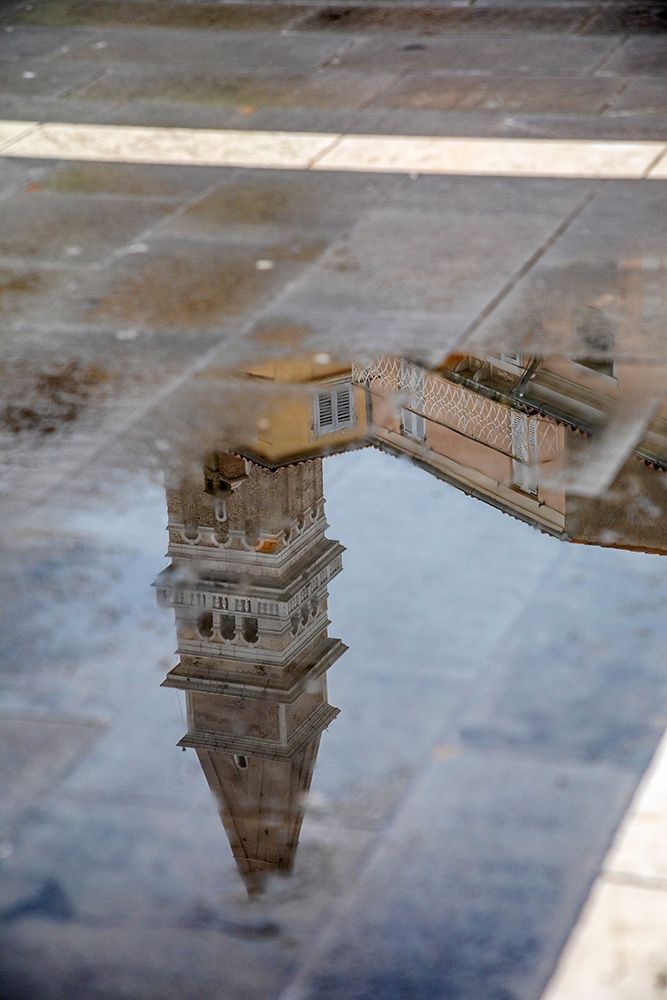 Slovenia-Piran Reflection of a tower after the rain